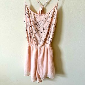 Beaded pink romper, size medium.